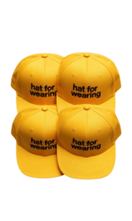 Neon yellow cap with meme text